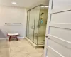 Bathroom featuring an enclosed shower