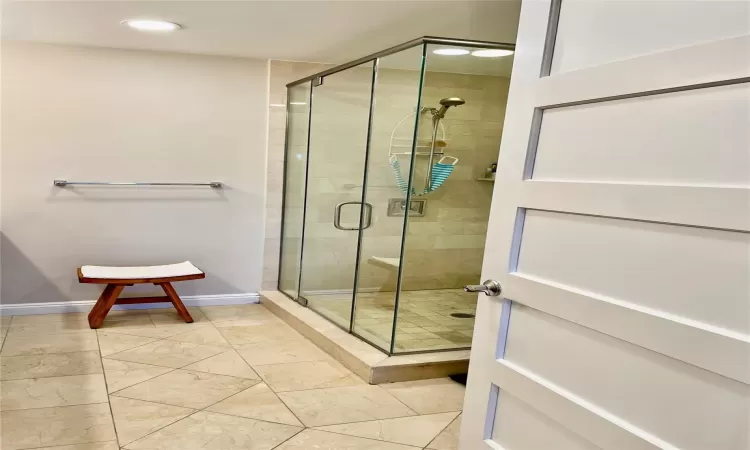 Bathroom featuring an enclosed shower