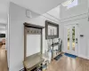 Entrance foyer with a chandelier and hardwood / wood-style floors