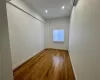 Empty room featuring hardwood / wood-style flooring