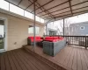 Wooden terrace featuring outdoor lounge area