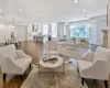 Living room with hardwood / wood-style flooring