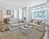 Living room with light hardwood / wood-style flooring