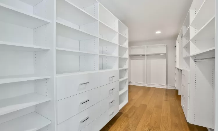 Walk in closet by California Closet