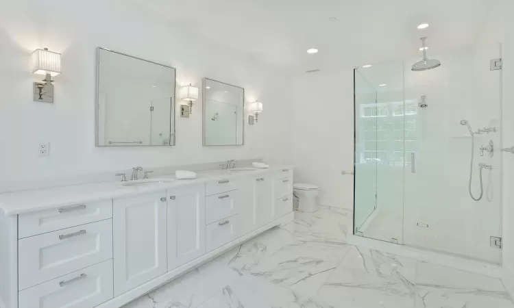 Bathroom with Bathroom featuring double vanity and free standing tub