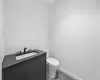 Bathroom with vanity and toilet