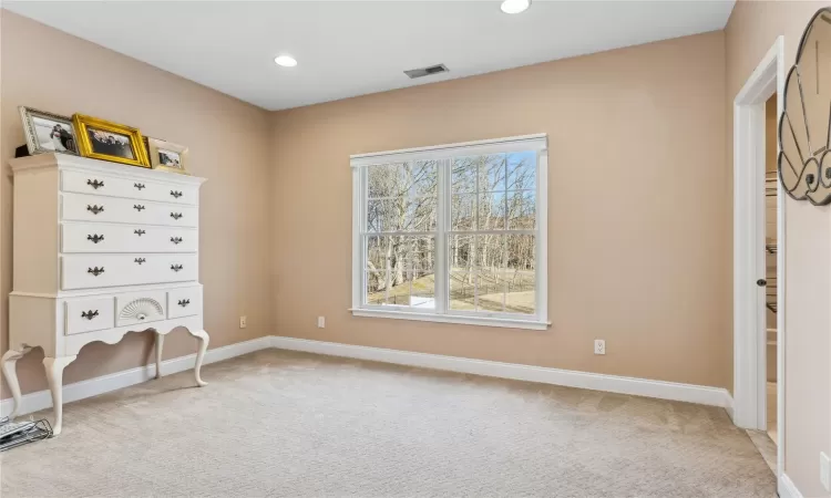 Unfurnished bedroom featuring carpet