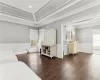 Bedroom featuring dark hardwood / wood-style floors and ornamental molding