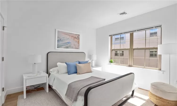 Bedroom featuring light wood-type flooring