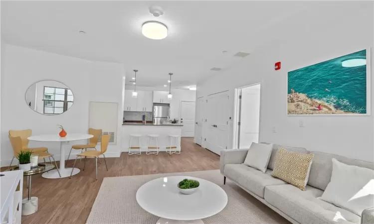 Living room featuring light hardwood / wood-style floors