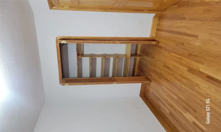 Unfurnished bedroom featuring light hardwood / wood-style flooring and a textured ceiling