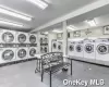 Laundry area with washing machine and dryer and stacked washing maching and dryer