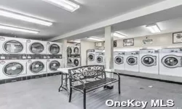 Laundry area with washing machine and dryer and stacked washing maching and dryer