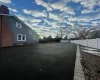 View of yard with an outbuilding and a garage