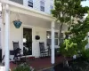 Entrance to property with covered porch