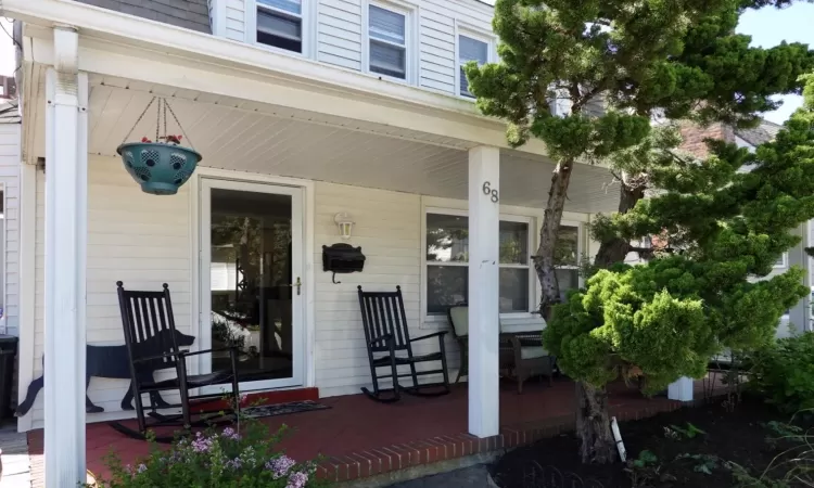 Entrance to property with covered porch