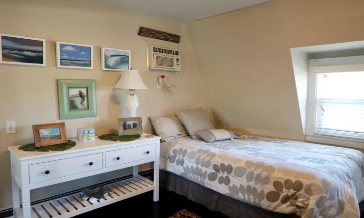 Bedroom with an AC wall unit