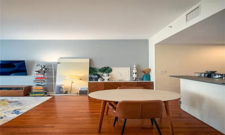 Dining room featuring wood-type flooring