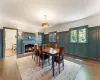 Dining room featuring dark wood-type flooring