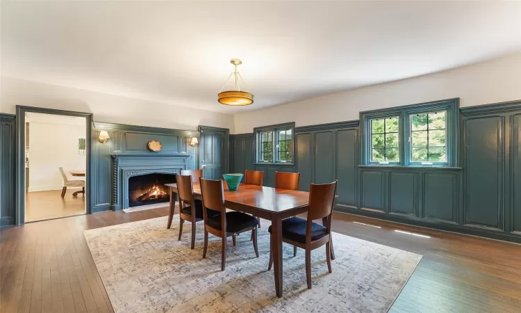 Dining room featuring dark wood-type flooring