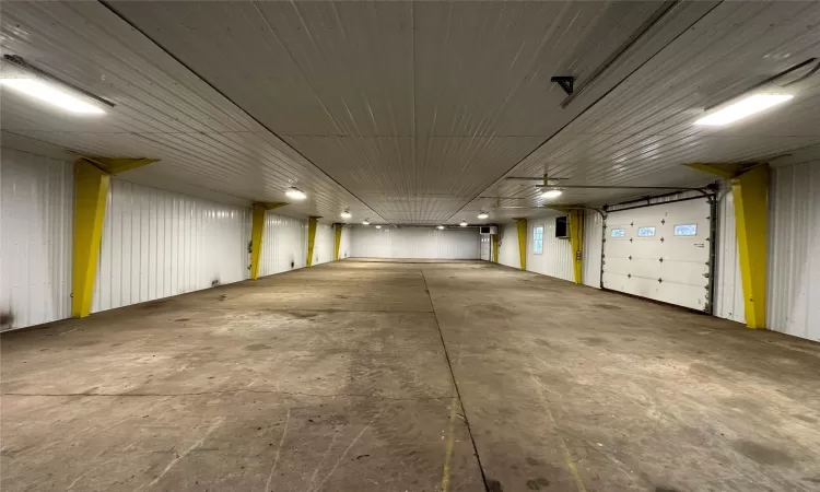 Garage featuring ceiling fan