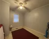 Unfurnished room featuring ceiling fan and crown molding