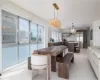 Dining area featuring sink and an inviting chandelier