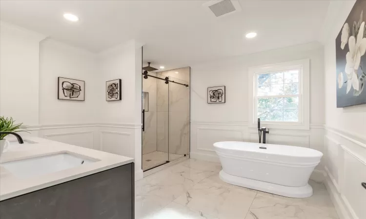 Bathroom with shower, free-standing tub, double vanity