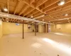 Basement with utilities, laundry area and outside entry