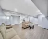 Living room with light hardwood / wood-style flooring