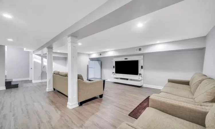 Living room featuring light hardwood / wood-style flooring