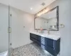 Bathroom with vanity and walk in shower