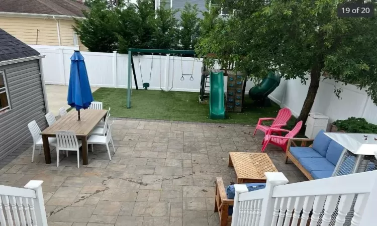 View of patio / terrace with outdoor lounge area and a playground