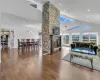 Open concept sunken Living Room with Vaulted Ceilings