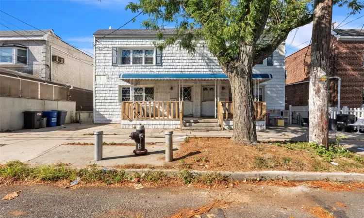 View of front of home with covered porch