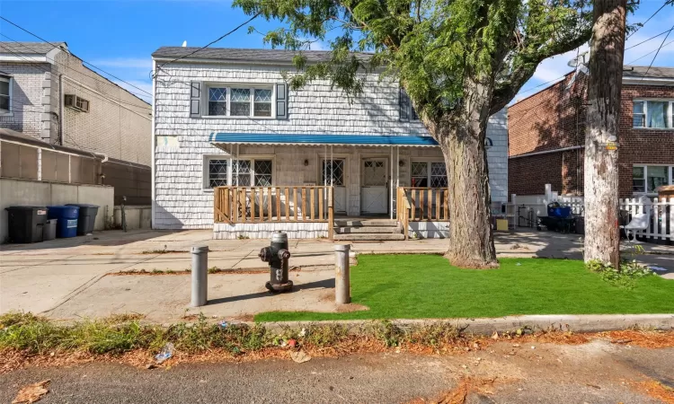 View of front of house featuring covered porch