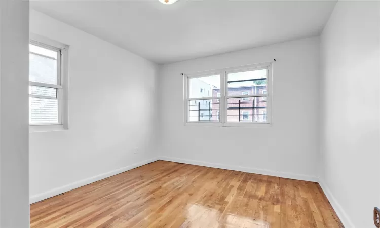 Spare room with light hardwood / wood-style flooring