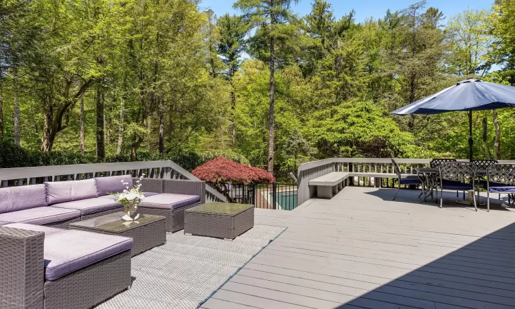 Wooden deck featuring an outdoor hangout area