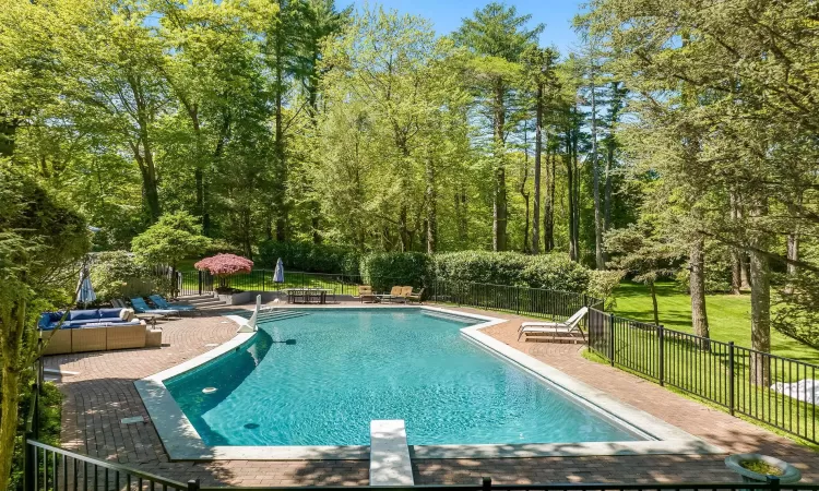 View of pool with a patio area