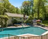 View of pool featuring a patio area and an outdoor hangout area