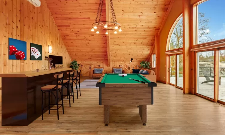 Recreation room featuring wood ceiling, high vaulted ceiling, plenty of natural light, and billiards