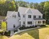 View of front of house with a front yard