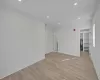 Unfurnished room featuring light wood-type flooring