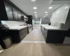 Kitchen featuring stainless steel appliances and light wood-type flooring