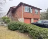 View of home's exterior featuring a garage