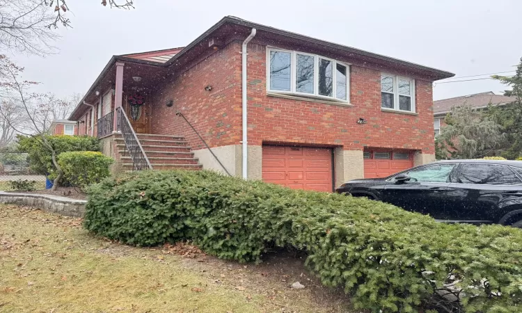 View of home's exterior featuring a garage