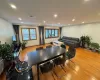 Dining room with a baseboard radiator and light hardwood / wood-style flooring