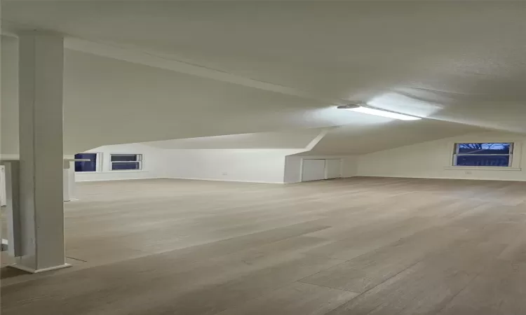 Bonus room featuring vaulted ceiling