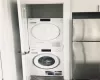 Clothes washing area with stacked washer / dryer