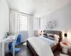 Bedroom featuring dark hardwood / wood-style flooring